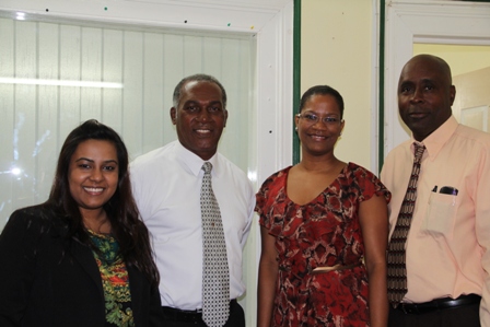 (L-R) Manager of International Admissions, Munroe College based in New York Ms. Krystle Dookoo, Premier of Nevis and Minister of Education Hon. Vance Amory, Director of Admissions at the College Mrs. Keija Nichol based at the Munro Collage St. Lucia Campus and Cabinet Secretary Mr. Stedmond Tross